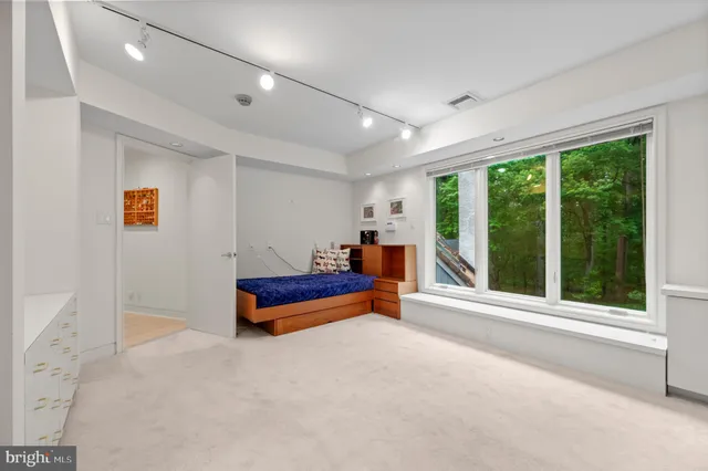 an empty room with windows