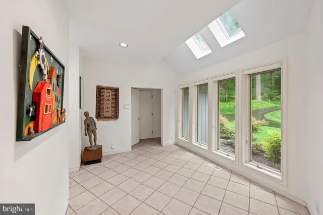 a view of a livingroom with a flesh screen tv