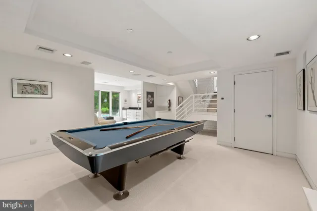 a view of a house with a yard and garden