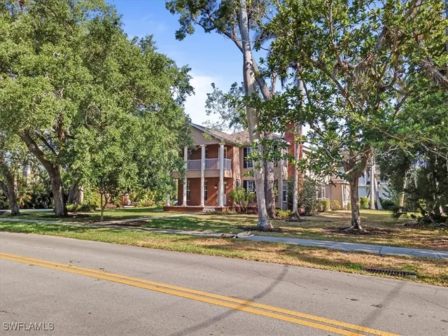 a picture of a bathroom with a shower