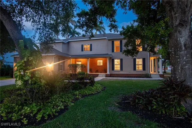 a view of house with yard