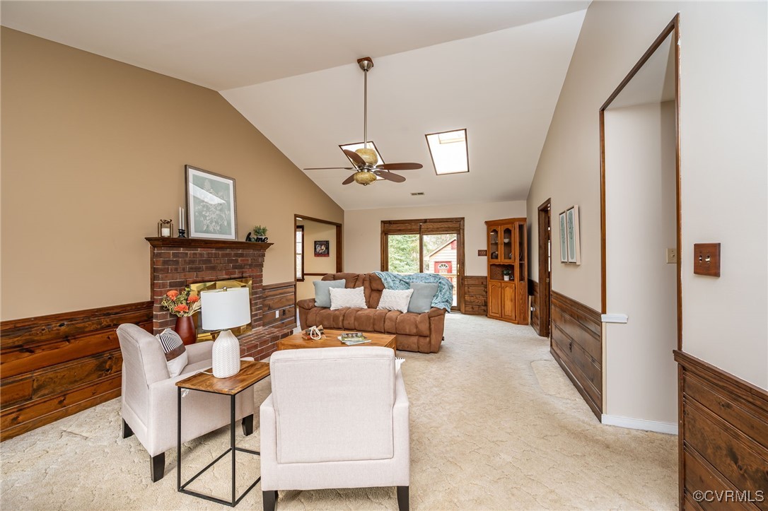 4724 Brookridge Road Chesterfield, VA 23832 - Photo 2 of 23 Living room featuring vaulted ceiling, two skyligh