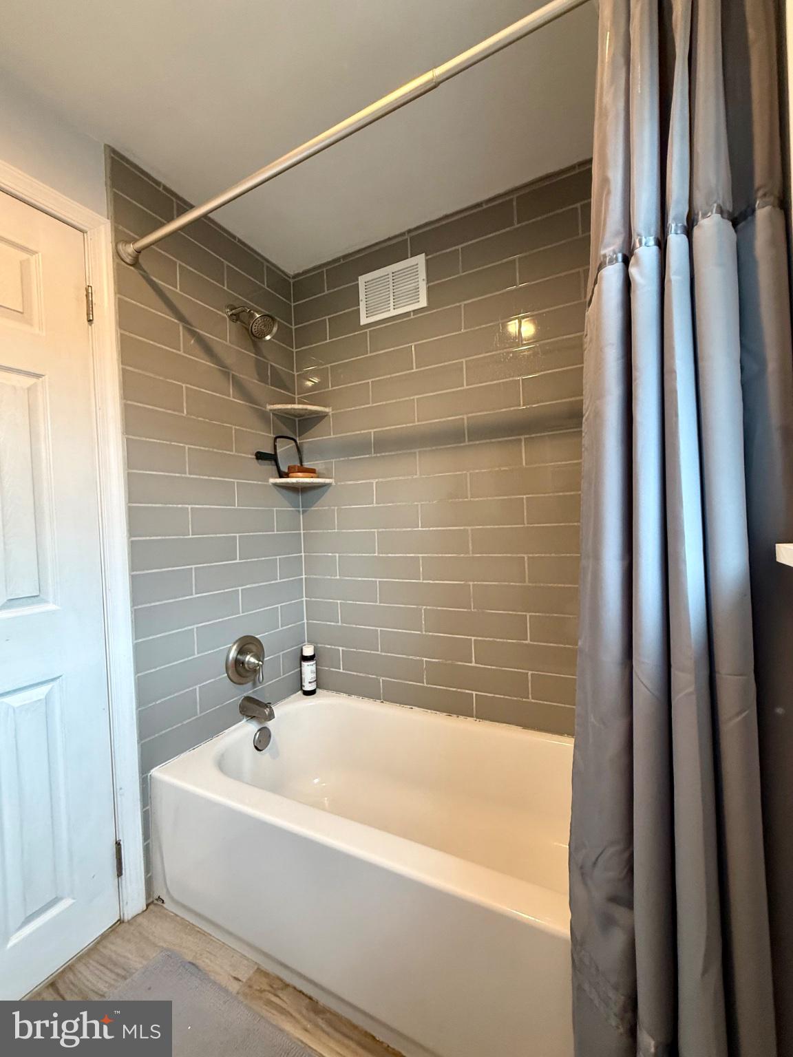 12820 Elnora Road Philadelphia, PA 19154 - Photo 22 of 31 Modern bath with sleek tile accents.
