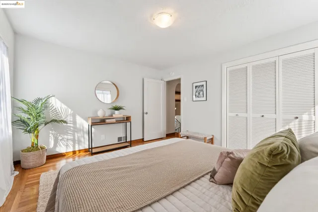 a living room with furniture a rug and a window