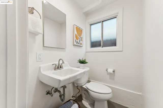 a view of a house with a tree