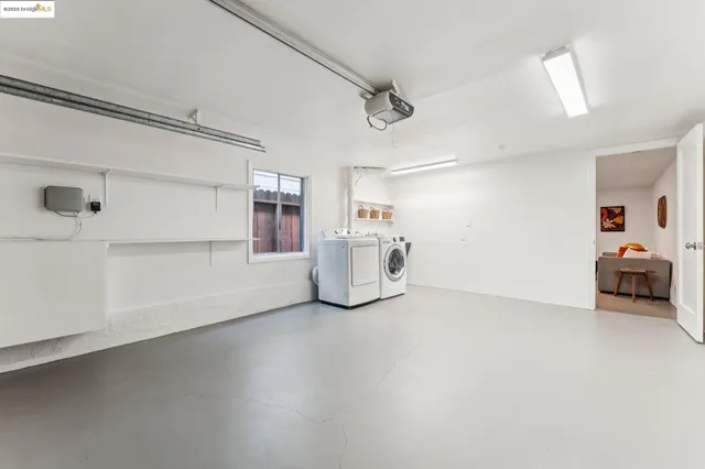 a backyard of a house with outdoor seating