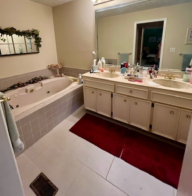 2369 Hoody Hudson Road Cataula, GA 31804 - Photo 10 of 12 a spacious bathroom with a double vanity sink and mirror
