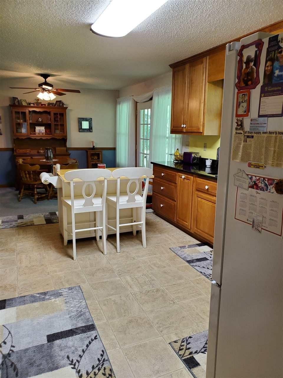 1627 Strawhill Road Southeast Cleveland, TN 37323 - Photo 14 of 48 a bed room with furniture and paintings on the wall