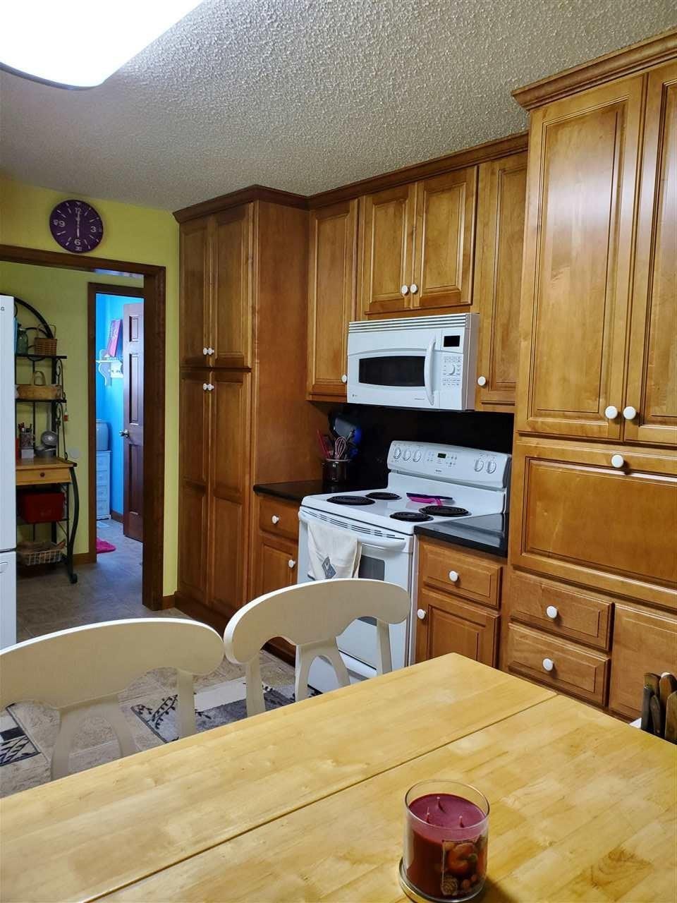 1627 Strawhill Road Southeast Cleveland, TN 37323 - Photo 15 of 48 a bedroom with a bed and wooden floor