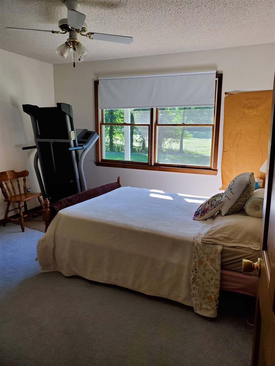 1627 Strawhill Road Southeast Cleveland, TN 37323 - Photo 21 of 48 a bed sitting in a room next to a window