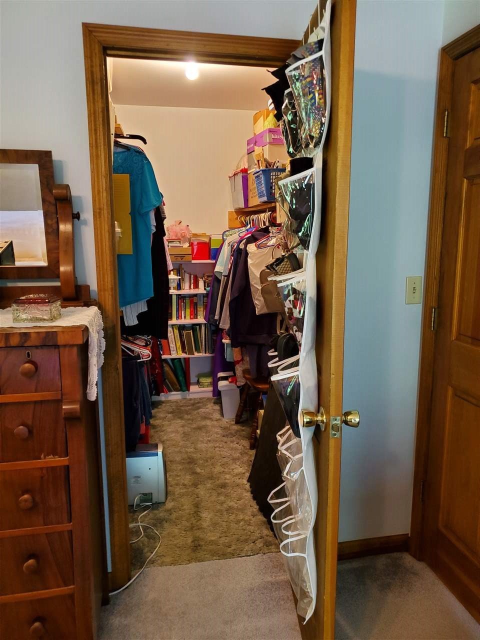 1627 Strawhill Road Southeast Cleveland, TN 37323 - Photo 29 of 48 a view of walk in closet with clothes and shoes