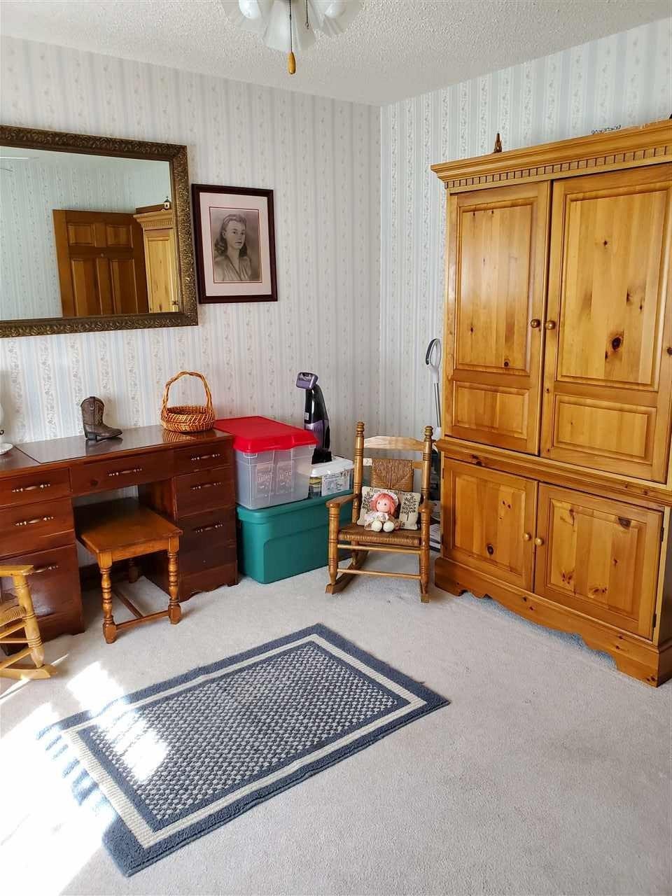1627 Strawhill Road Southeast Cleveland, TN 37323 - Photo 32 of 48 a living room with furniture and a yard