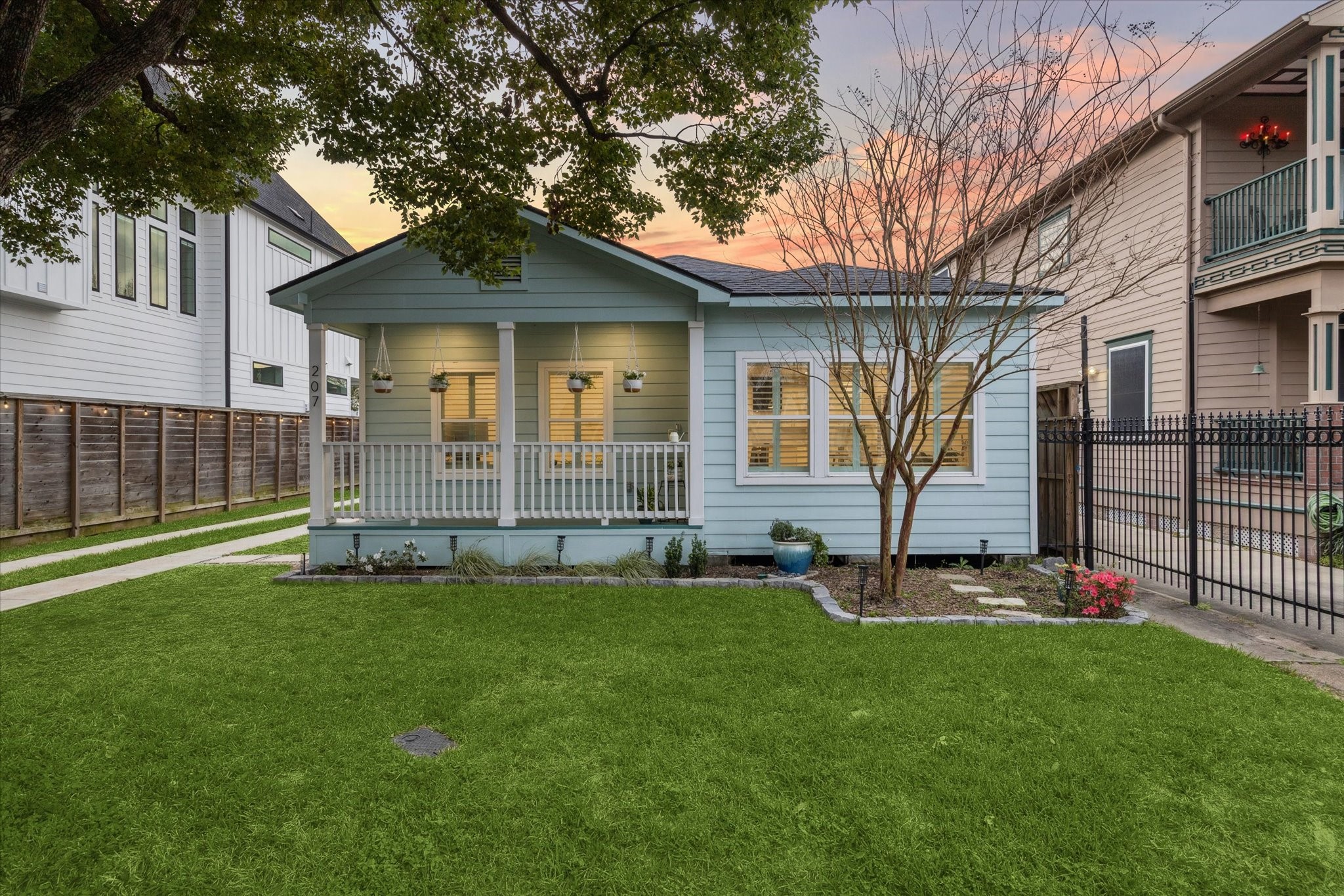 a front view of a house with a yard