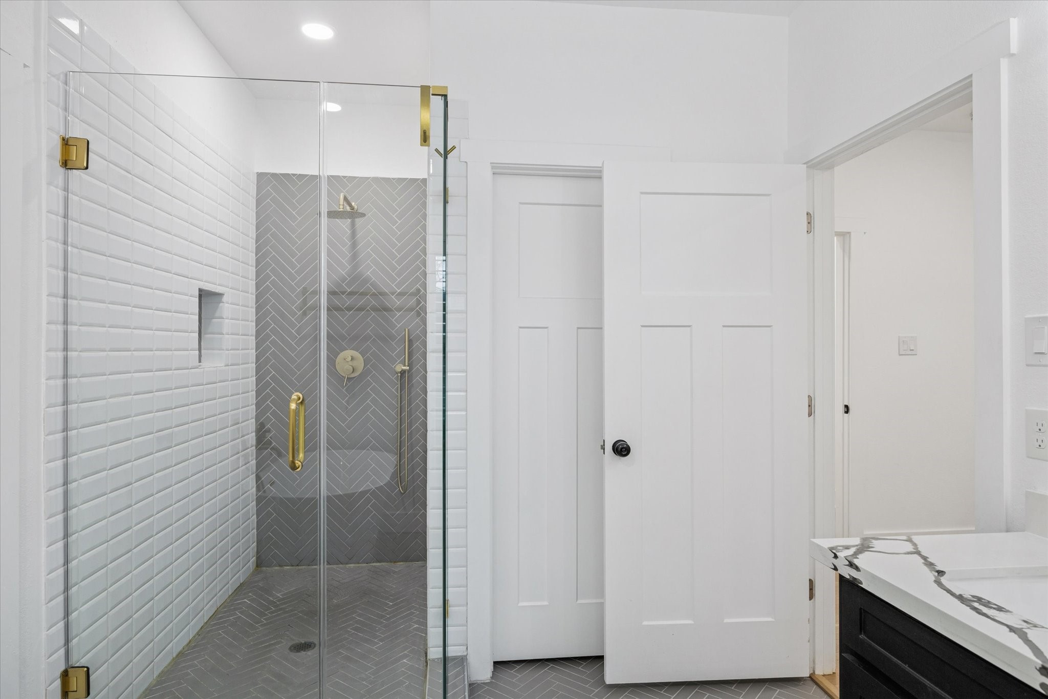 207 Tabor Street Houston, TX 77009 - Photo 13 of 25 a bathroom with a shower and a sink