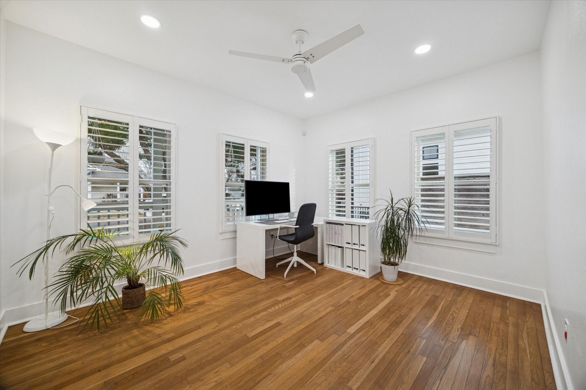 207 Tabor Street Houston, TX 77009 - Photo 15 of 25 a view of a livingroom with furniture and a flat screen tv
