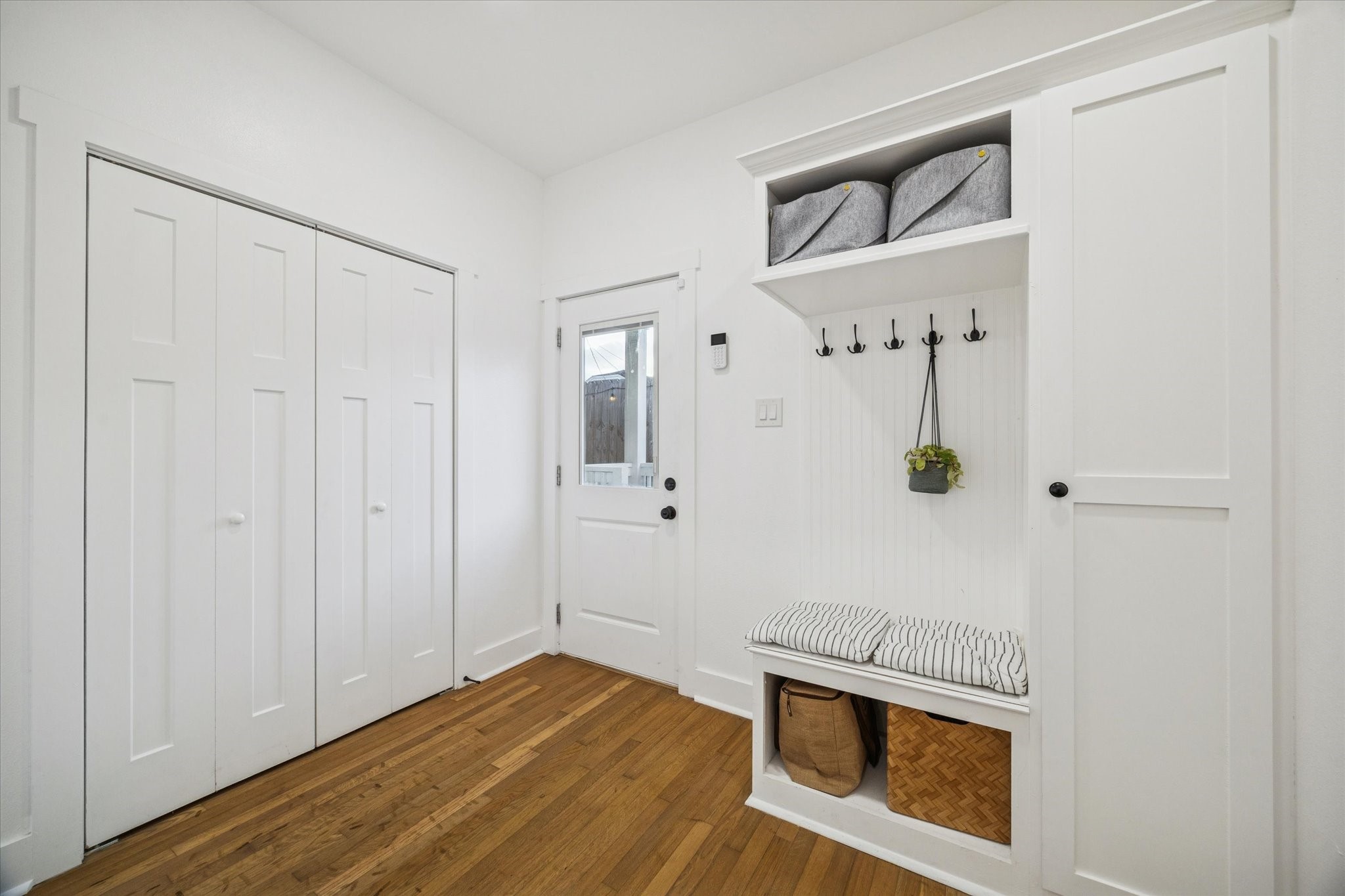 207 Tabor Street Houston, TX 77009 - Photo 18 of 25 back utility space, convenient built ins. storage, large laundry room not seen in photo.