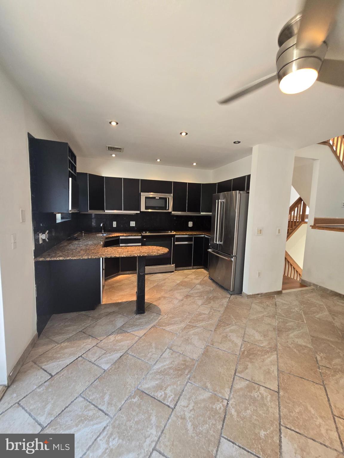 793 South Front Street Philadelphia, PA 19147 - Photo 1 of 32 a kitchen with stainless steel appliances granite countertop a refrigerator and a stove
