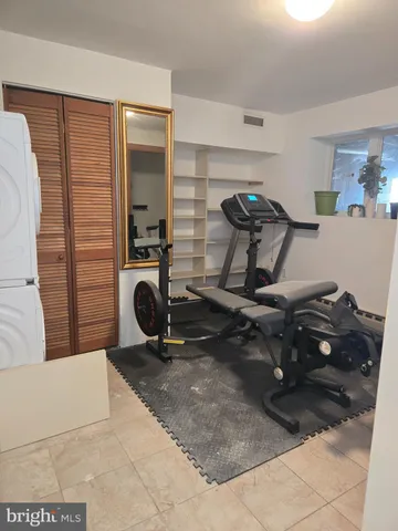 a room with table and chairs