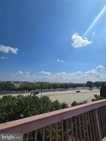 a view of a patio in backyard