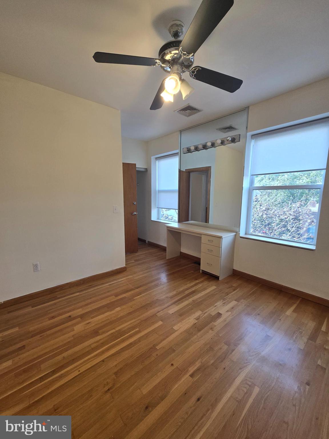 793 South Front Street Philadelphia, PA 19147 - Photo 10 of 32 wooden floor in an empty room with a window
