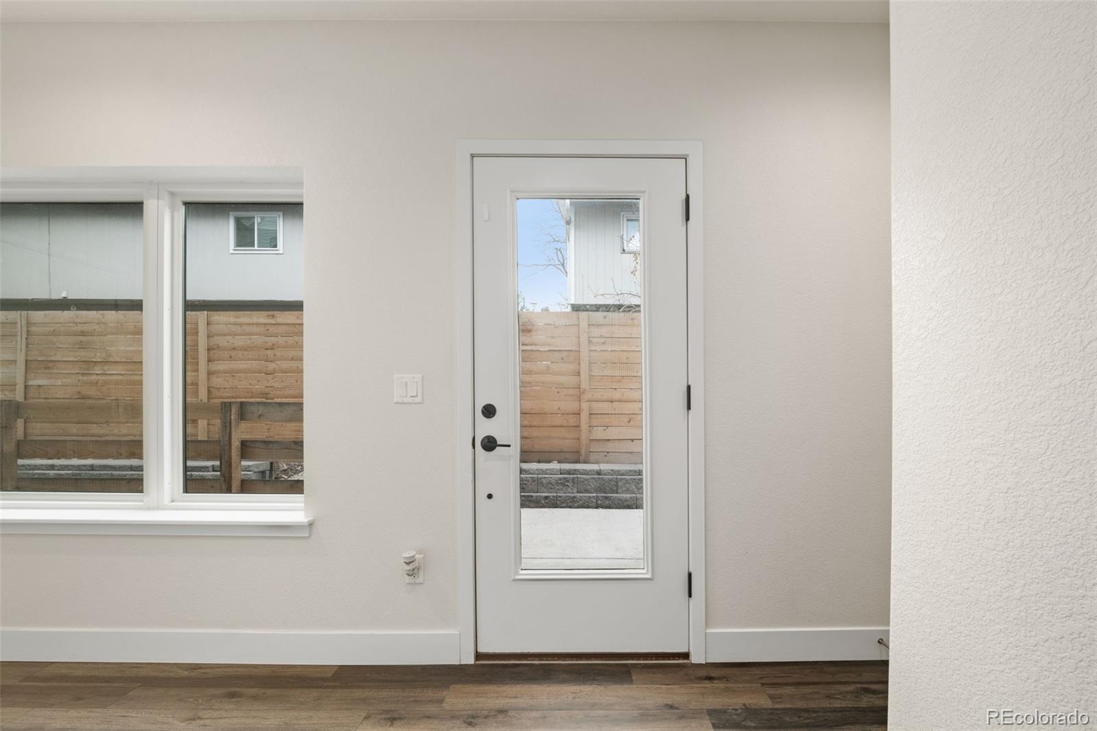 1204 South Reed Street Lakewood, CO 80232 - Photo 27 of 45 a view of wooden door
