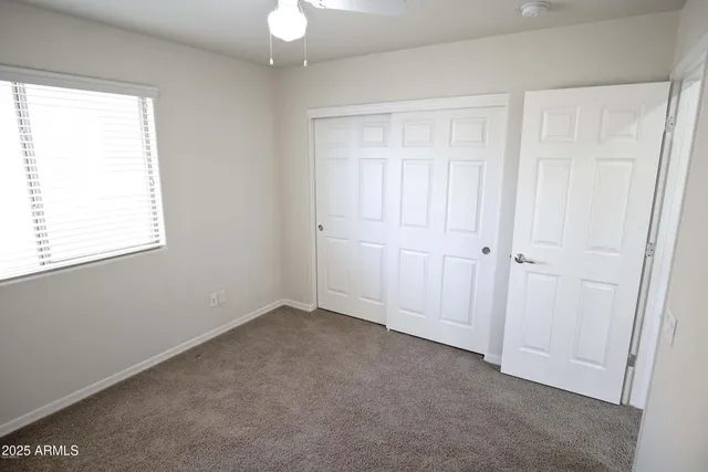 a bathroom with a toilet and a bathtub