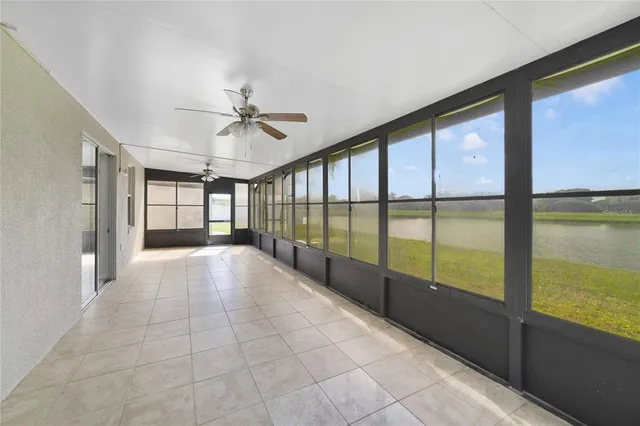 a view of an entryway with a floor to ceiling window