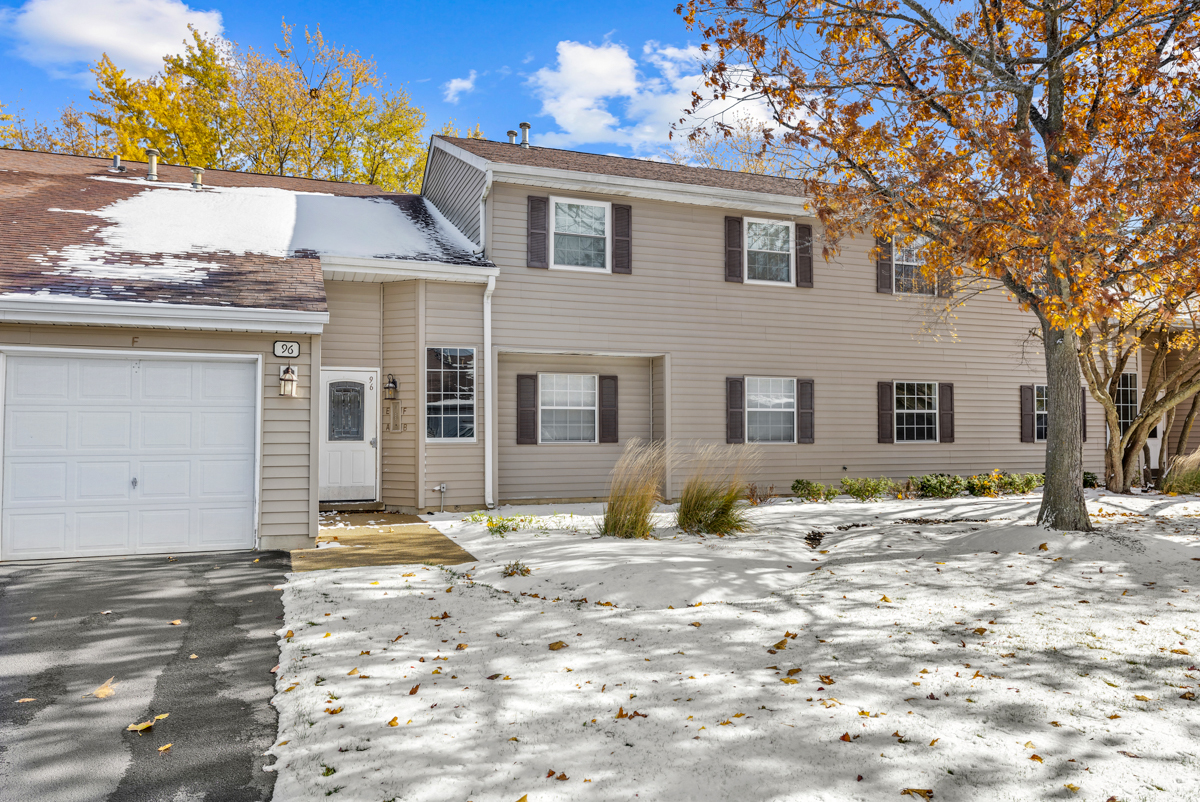 96 Gant Circle, Unit B Streamwood, IL 60107 - Photo 17 of 21 a view of a house with snow on the road