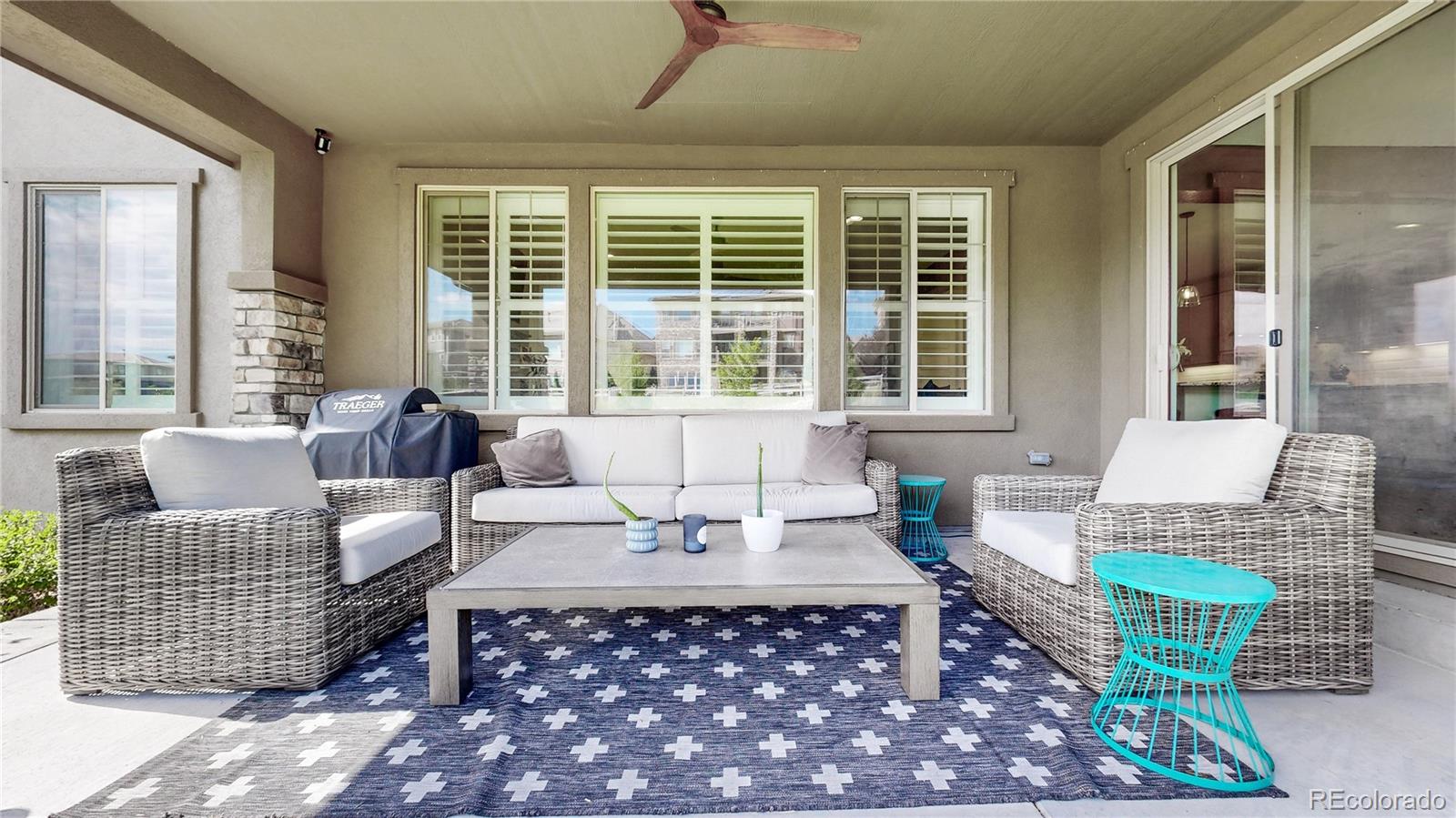 1476 Red Sun Way Highlands Ranch, CO 80126 - Photo 28 of 37 a living room with furniture and a large window