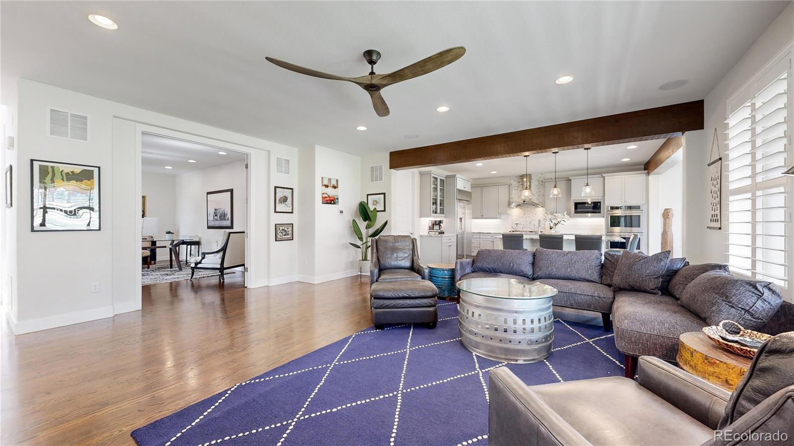 1476 Red Sun Way Highlands Ranch, CO 80126 - Photo 4 of 37 a living room with furniture and a large window