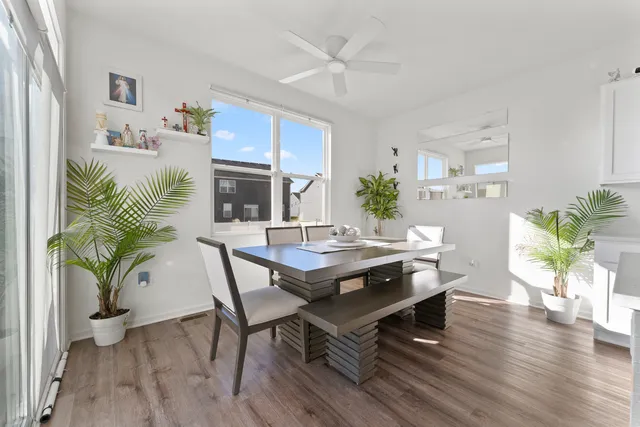 a view of a house with backyard porch and sitting area