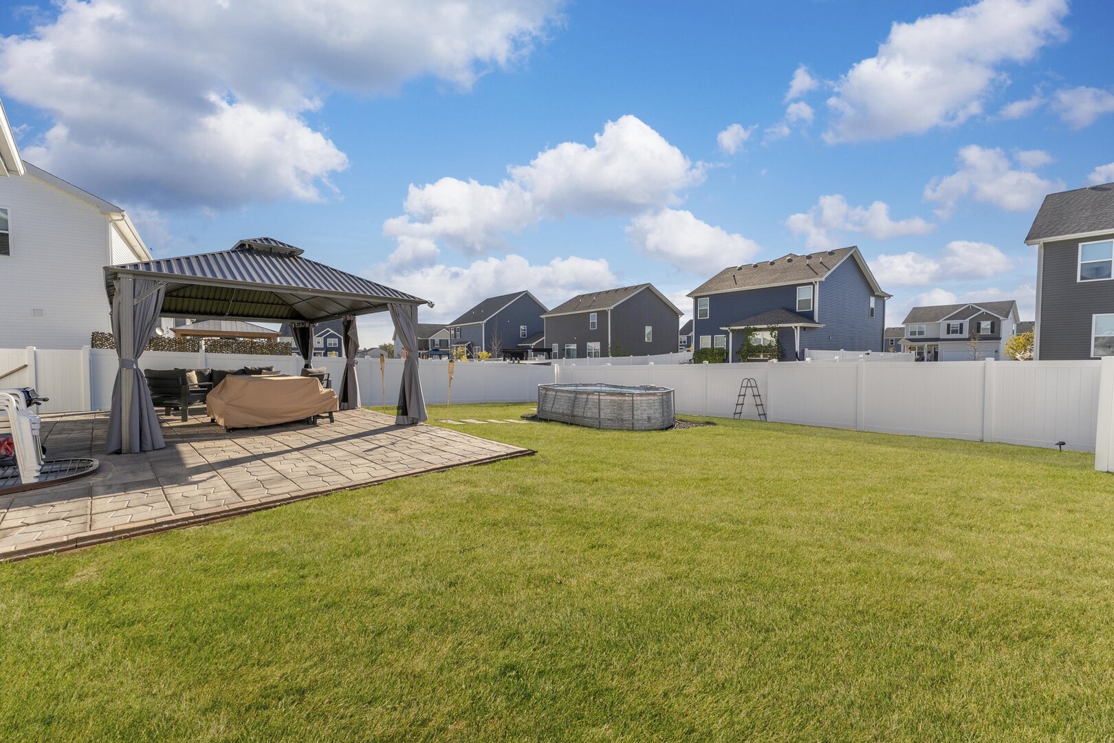 2017 Lilyana Lane Plainfield, IL 60586 - Photo 14 of 43 a view of outdoor space yard and swimming pool