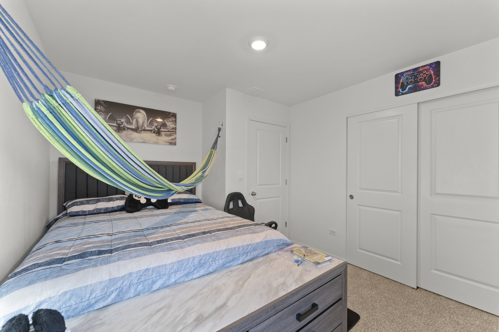 2017 Lilyana Lane Plainfield, IL 60586 - Photo 21 of 43 a bedroom with a bed and a dresser