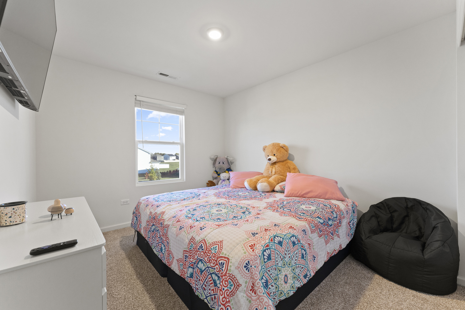 2017 Lilyana Lane Plainfield, IL 60586 - Photo 24 of 43 a bedroom with a bed and window