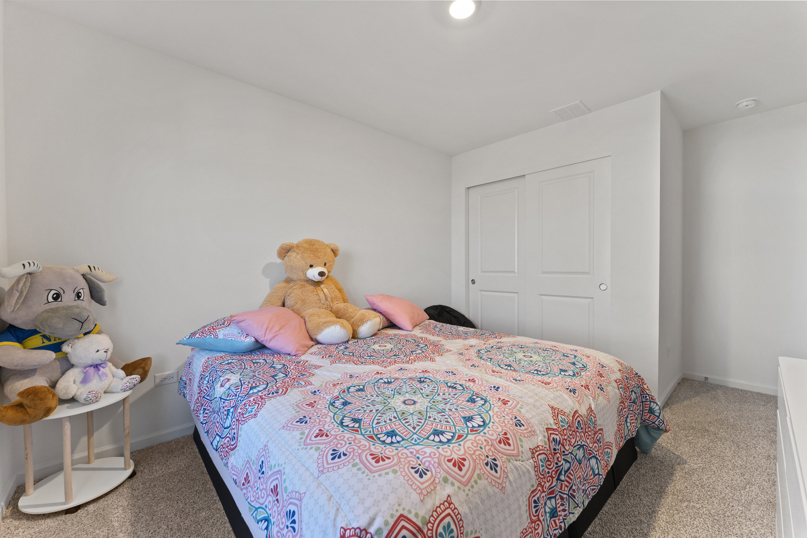 2017 Lilyana Lane Plainfield, IL 60586 - Photo 25 of 43 a bedroom with a bed and wooden floor