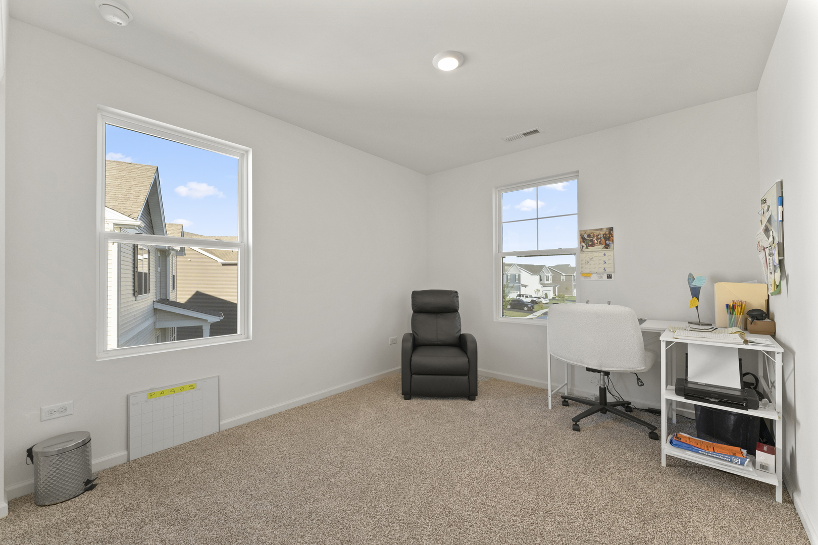 2017 Lilyana Lane Plainfield, IL 60586 - Photo 26 of 43 a room with furniture and a window