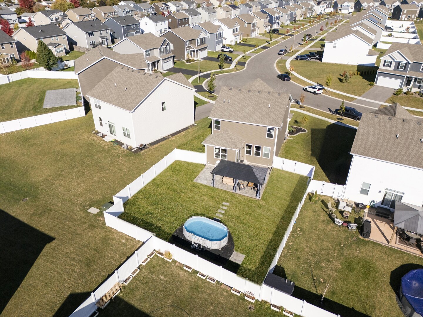 2017 Lilyana Lane Plainfield, IL 60586 - Photo 37 of 43 an aerial view of a house with swimming pool