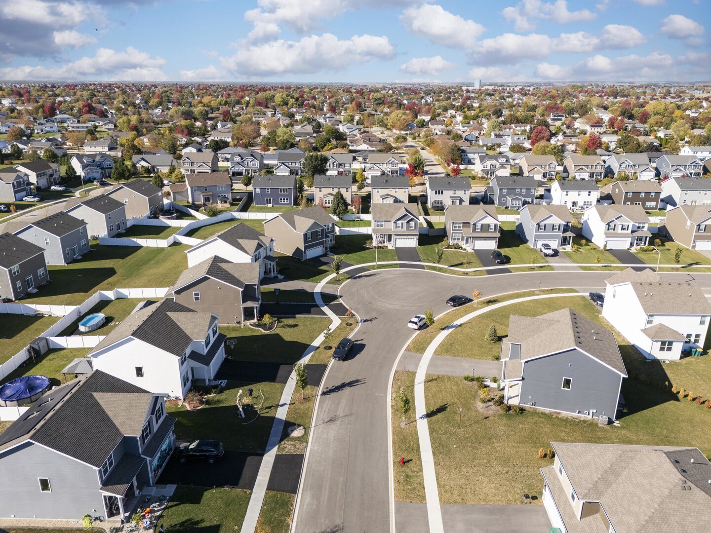 2017 Lilyana Lane Plainfield, IL 60586 - Photo 38 of 43 an aerial view of a house with a swimming pool
