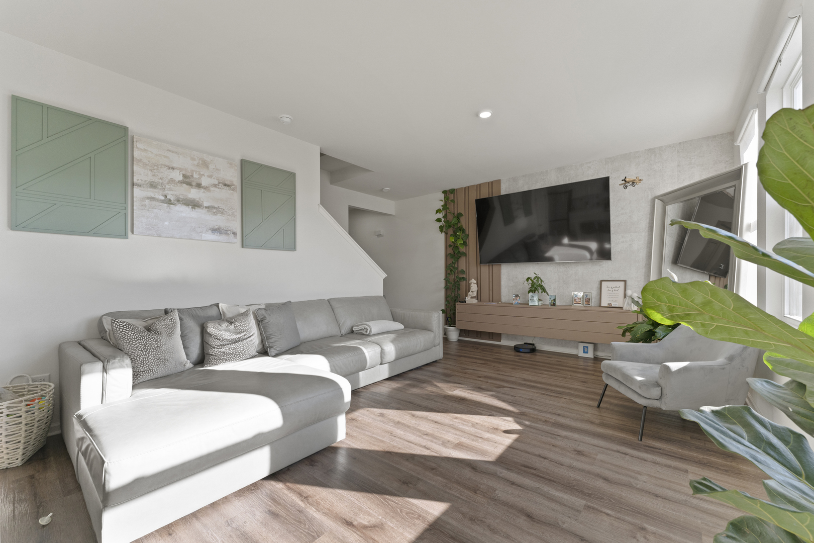 2017 Lilyana Lane Plainfield, IL 60586 - Photo 4 of 43 a living room with furniture and a flat screen tv