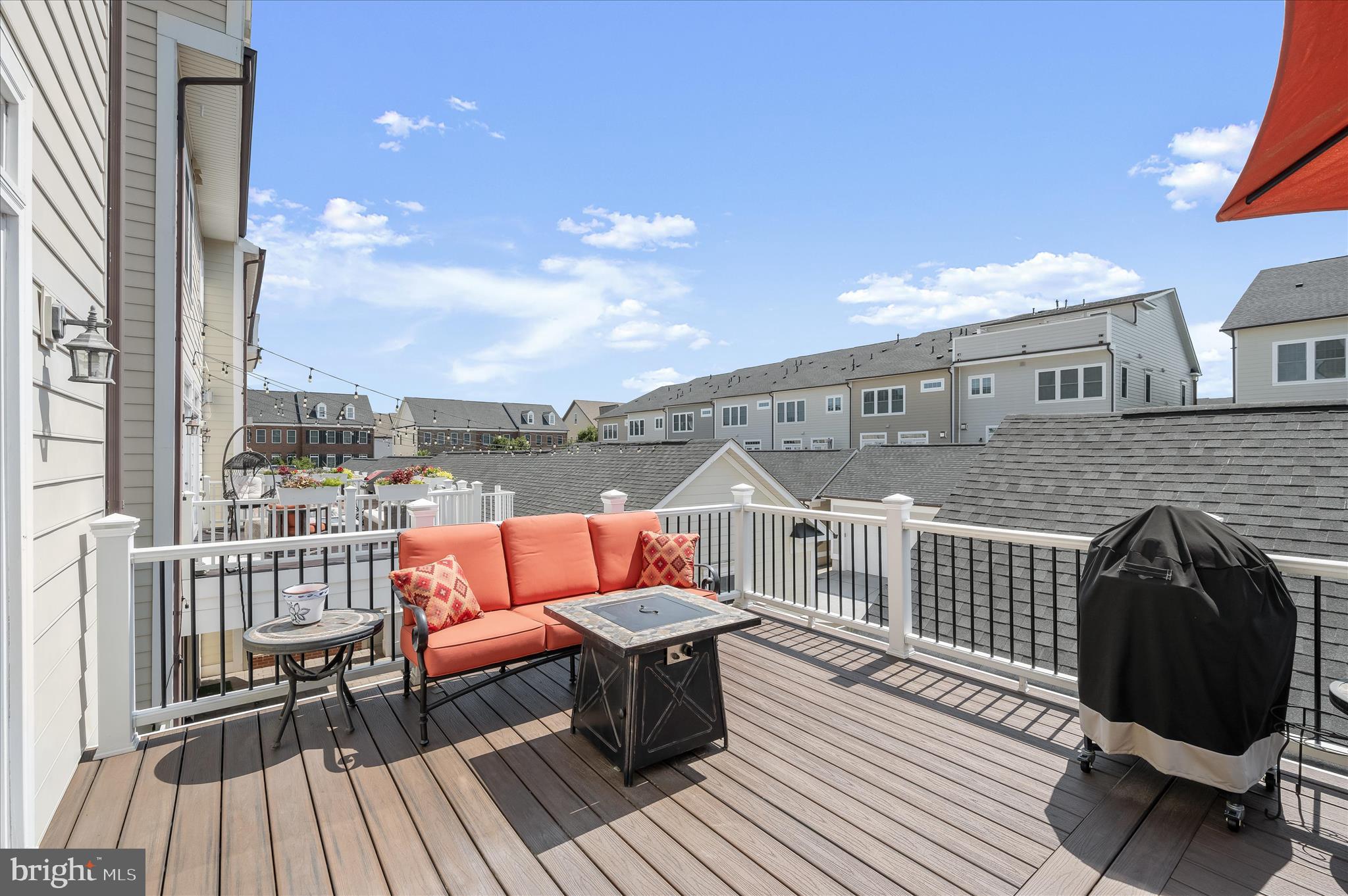 11285 Terrace Lane Fulton, MD 20759 - Photo 23 of 52 a balcony with wooden floor and outdoor seating