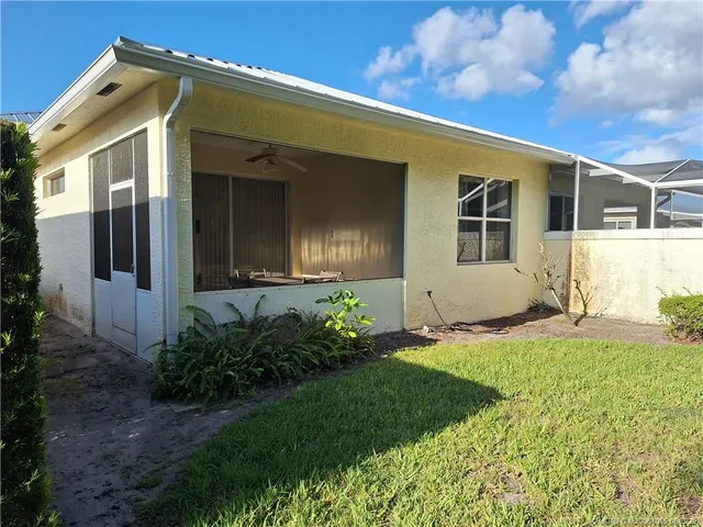 a view of a house with garden