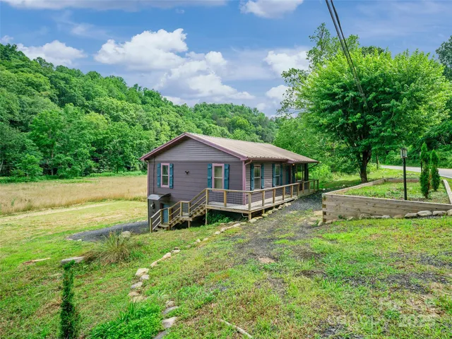 a house view with a garden space