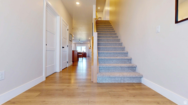 1127 4240 North Enoch, UT 84721 - Photo 31 of 56 Staircase with hardwood / wood-style floors and recessed lighting