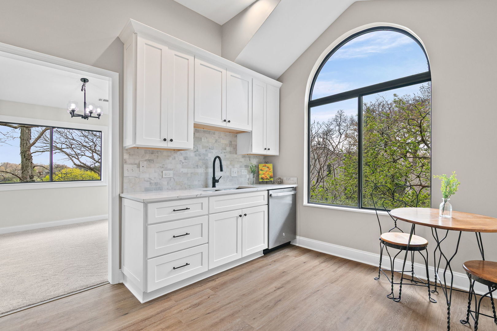 753 Shoreline Road Lake Barrington, IL 60010 - Photo 16 of 21 a kitchen with granite countertop a stove a sink cabinets and wooden floor