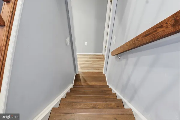 a view of balcony with wooden floor
