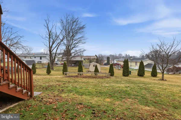 a balcony with wooden floor