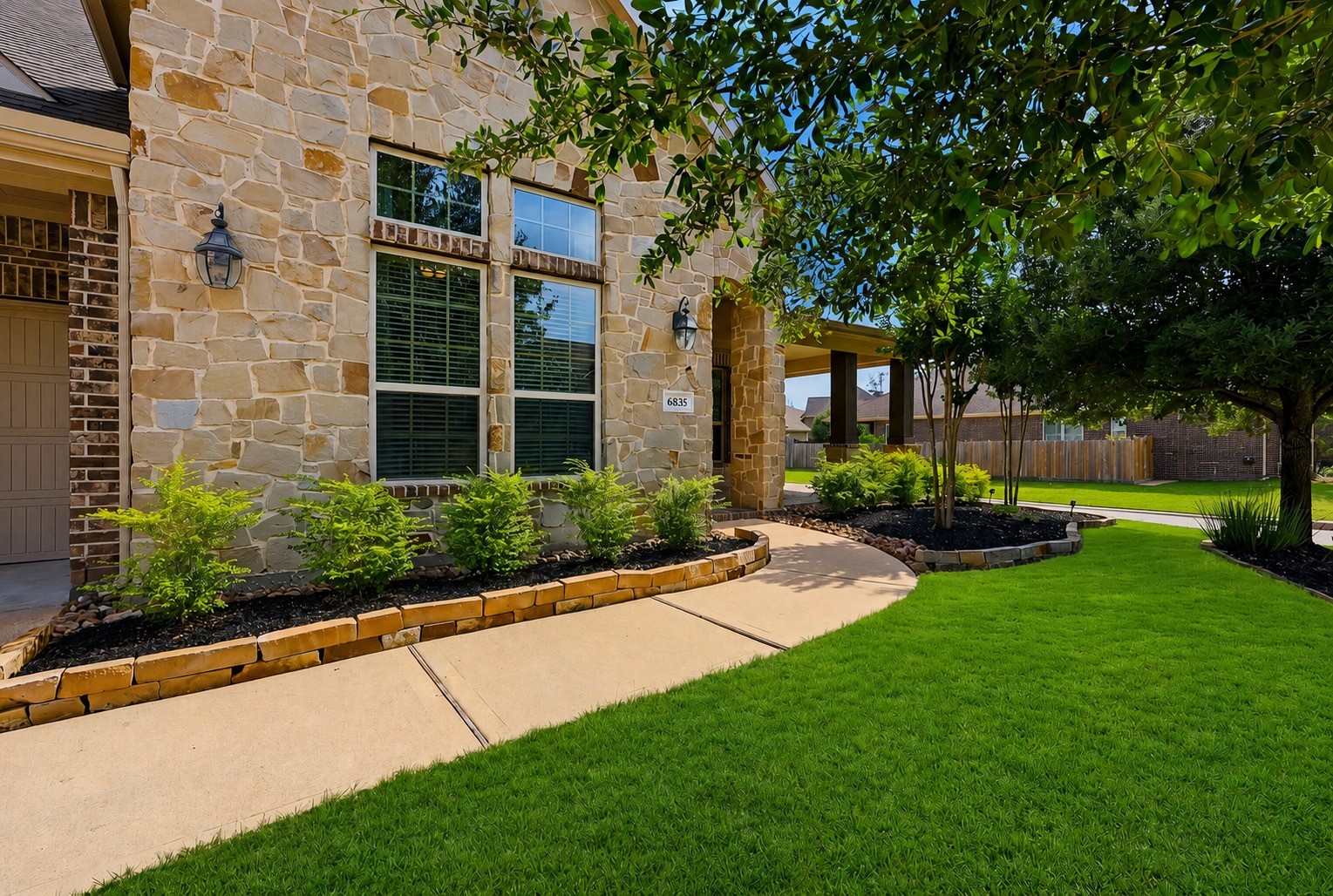 6835 Preston Grove Drive Spring, TX 77389 - Photo 5 of 49 a view of a house with a yard and tree s