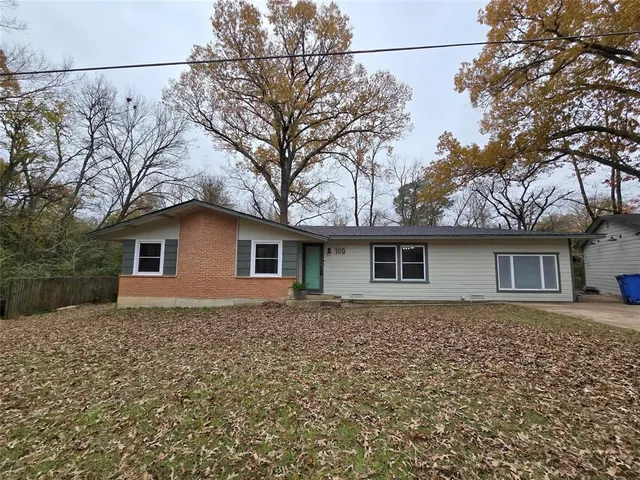 front view of house with a yard