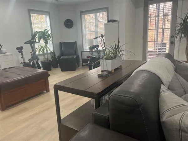 a living room with furniture and a table