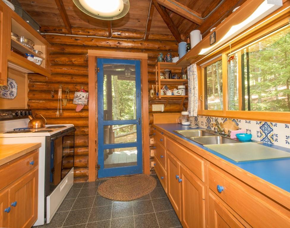 97 Appalachee Road Boothbay Harbor, ME 04538 - Photo 11 of 19 The kitchen, with wood cupboards...